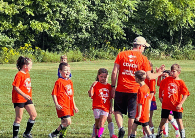 Youth Sports Building Confidence While Volunteer Coaches Set Positive Examples